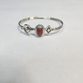 Red coral cabochon sterling silver cuff with stamped accents — Navajo handcrafted by Teddy
