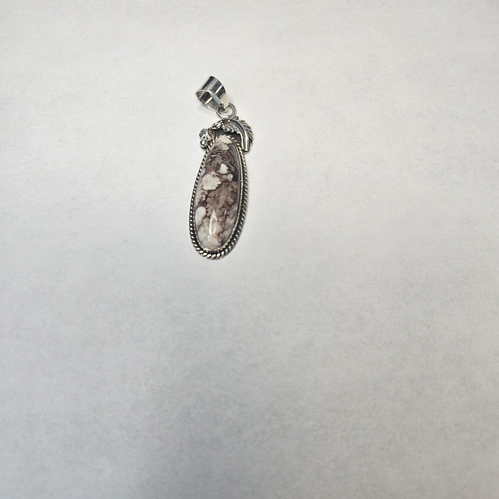 Wild Horse magnesite long oval pendant in sterling silver — Navajo handcrafted by Teddy