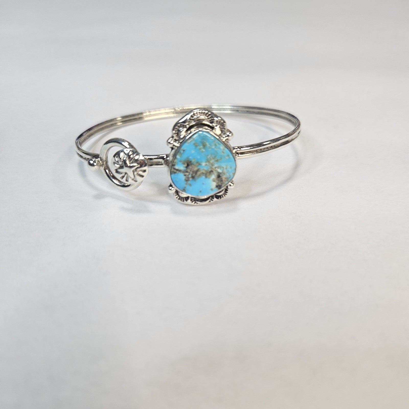 Pear-shaped sky-blue turquoise cabochon sterling silver cuff — Navajo handcrafted by Teddy