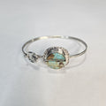 Boulder turquoise cabochon showing host rock, sterling silver cuff — Navajo handcrafted by Teddy