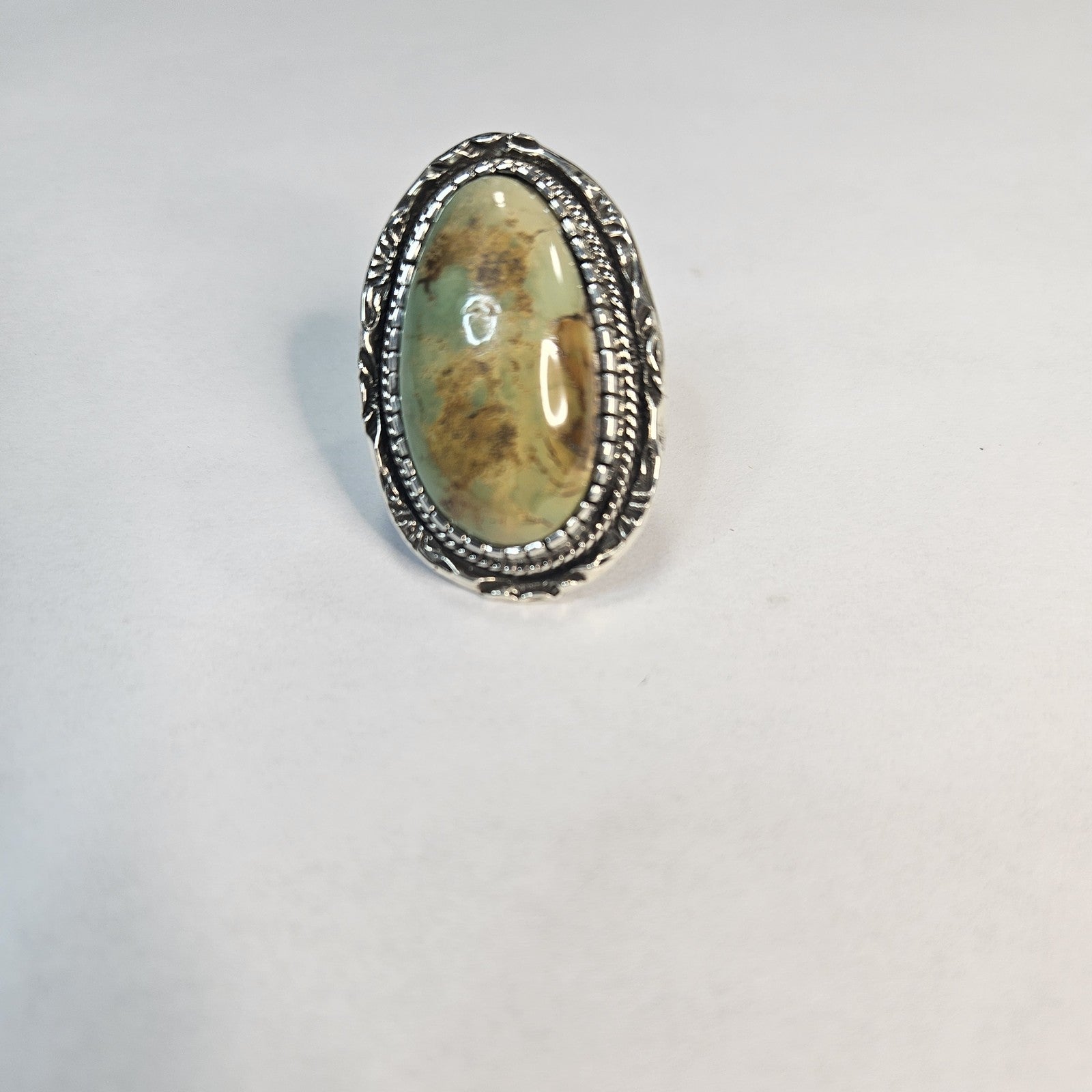 Large oval Royston turquoise cabochon ring in ornate sterling silver setting — Navajo handcrafted by Teddy